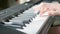 Selective focus to women fingers and piano key to play the piano. There are musical instrument for practice piano or learning musi