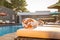 Selective focus at towel pool on beach bed around swimming pool in hotel.