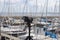 Selective focus view at a camera filming at a yacht port in Kiel in Germany