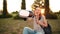 Selective focus on virtual reality glasses in the hands of a young smiling girl.