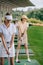 selective focus of woman in cap and sunglasses playing golf