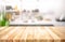 Selective focus.Wood table top on blur kitchen counter background.For montage product display or design key visual layout