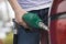 Selective Focus Of A Young Man Refueling His Car