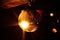 Selective shot of a dusty and partly shiny disco ball at a dance hall concert venue