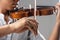 In selectve focus of human hand holding bow,showing how to  play violin