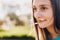 Self-confidence. Young teenage girl with serene smile in forest.