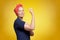 Self-confident senior woman rosie riveter