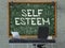 Self Esteem - Hand Drawn on Green Chalkboard. 3D Render.