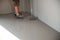 Self-leveling epoxy. Leveling with a mixture of cement floors