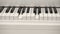 Self-Playing White Piano Without Pianist. Playing Piano Itself. Close Up Front view