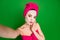 Self-portrait of lovely nude feminine glamorous lady wearing turban facial mask enjoying touching pout lips isolated on