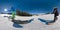 SELFIE: Cool shot of a male snowboarder sliding along a metal pipe in fun park