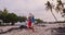 Selfie couple on Hawaii beach vacation with palm trees in Big island