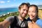 Selfie couple travel fun with Honolulu Hawaii