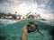Selfie of a female woman tourist snorkelling at tropical beach a