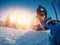 Selfie Guy sportsman goes on normal skiing on ski slope with action camera. Sunset. winter