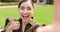 Selfie, hand gesture and face of woman at park taking pictures for social media with happy influencer. Portrait, profile