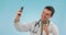Selfie, happy man and doctor with stethoscope, pointing at picture and peace sign in studio. Photography, medical