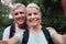 Selfie, hiking and portrait of senior couple with smile on adventure in forest, woods and mountain for exercise. Fitness