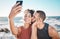 Selfie kiss, gratitude and couple with a phone for streaming, training and love at the beach in Bali. Caring, exercise