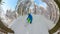 SELFIE: Male snowboarder shredding the powder snow off trail in the scenic Alps.