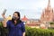 Selfie with mobile phone of Latina tourist woman with protection mask on terrace with cathedral view in San Miguel de Allende, Gu