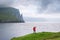 Selfie overlooking Trollkonufingur rock pillar on Vagar Island, Faroe Islands