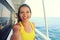 Selfie photo of young model woman on luxury travel cruise vacation in yellow dress enjoying the evening on Amalfi Coast