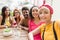 Selfie portrait. Mixed race group socializing in a party at rest