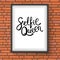 Selfie Queen Phrase in a Frame on Brick Wall