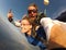 Selfie tandem skydiving with pretty woman