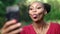Selfie, tongue or happy black woman in park with nature, smile and happiness. Funny girl, goofy or crazy face female on