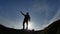 Selfie travel silhouette concept. Man makes a selfie traveling with backpack hiking in mountains sunset. Travel success