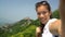 Selfie video - tourist at Great Wall of China excited and happy having fun