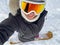 SELFIE: Young Caucasian woman smiles while snowboarding off piste in the Alps.