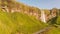 Seljaland Waterfall, aka Seljalandsfoss, aerial view on a sunny summer day, Iceland