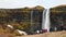 Seljalandsfoss, Iceland - 5th march, 2023: tourist groups visit Seljalandsfoss waterfall in Iceland in spring. Peak holiday season