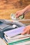 Seller at bookstore using cash register