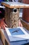 Seller hands handmade bird house nesting box