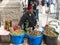 The seller offers the olives their own pickles in the eastern bazaar in the old city of Nazareth in Israel