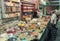 The seller in the open shop weighs the spice buyer in the Mahane Yehuda market in Jerusalem, Israel