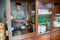 the seller prepares to cook the chicken noodle dish