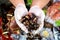 Seller presenting a spanish shellfish percebes