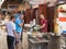 The seller sells the clients to the shawarma on the market in the old town of Acre in Israel