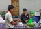 Selling betel leaf at market in Yangon, Myanmar