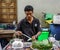 Selling betel leaf at market in Yangon, Myanmar