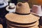 Selling classic straw hats on street market