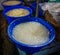 Selling Nata de coco and seaweed in blue plastic bucket at traditional market photo taken in Jakarta Indonesia