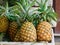 Selling pineapple fruits at rural market