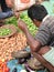 Selling potatoes at the weekly market